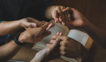 Christian Bible Study Concepts. Group of Christian read and study the bible together in a home....