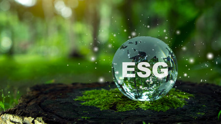 ESG letter on tcrystal globe for environmental, social, and governance in sustainable and ethical business on the Network connection on a green background.の写真素材