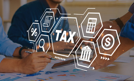 Group of business people meeting to complete Individual income tax return form online for tax payment.The new year 2023 tax concept.Income tax return.の写真素材
