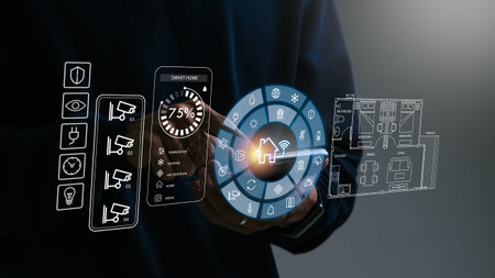 Smart home concept.Hand of man using smart home control app on mobile phone.Remote home...