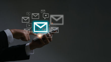 Email concept.Businessman using smart phone for email with notification alert, Online communication concept.email icons.の写真素材