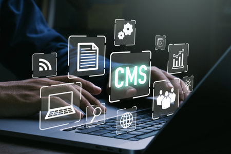 CMS - Content management system concept.Businessman using laptop to management cms software for publishing content.Blog promotion, data administration and website optimization concept.の写真素材