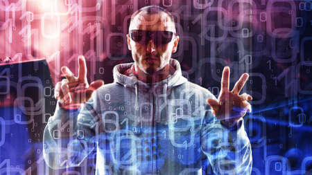 Hacker typing on holographic keyboardの写真素材