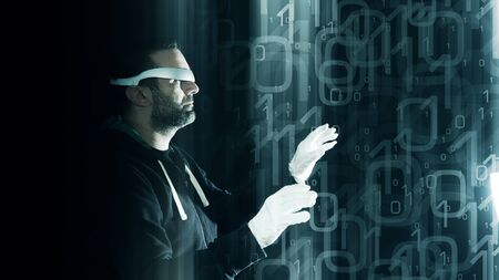 Virtual reality glasses concept idea, futuristic hacker attack binary backgroundの写真素材