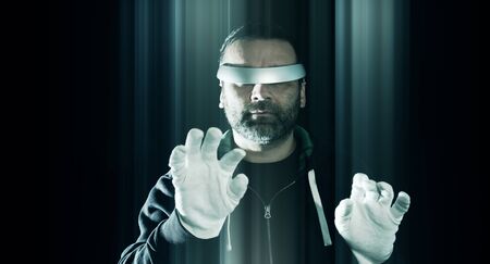 Virtual reality glasses concept, hacker hacking at nightの写真素材