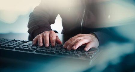 Man hands typing on computer keyboard