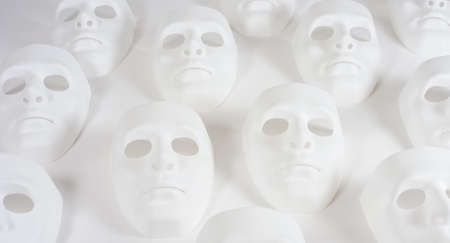 Sad white masksの写真素材