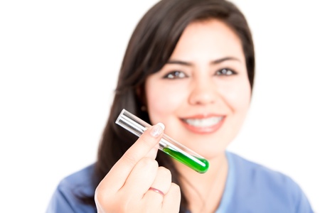 laboratory assistant analyzing a test tubeの写真素材
