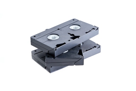Pile of videotapes on  white background, studio shotの写真素材