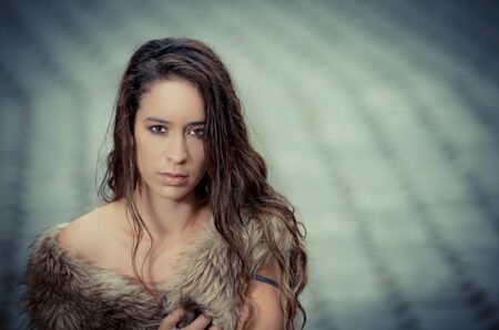 beautiful woman in a fur coatの写真素材