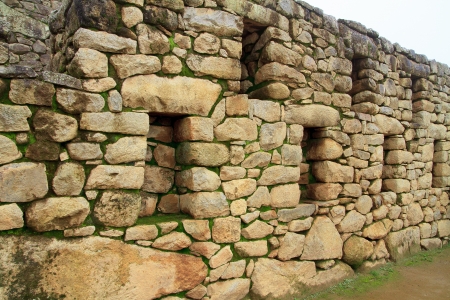 Inca wall in the ancient city of Machu Picchuの写真素材