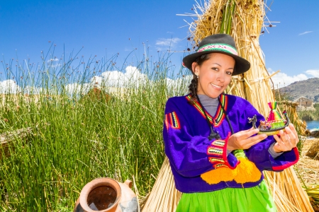 Woman in traditional clothes, lake Titicaca の写真素材