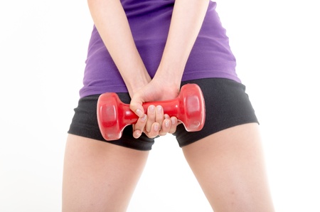 Women holding dumbbell on white backgroundの写真素材