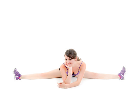 young woman show perfect split isolated