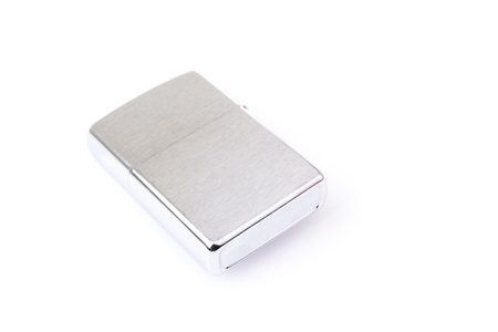 Silver metal lighter isolated on whiteの写真素材