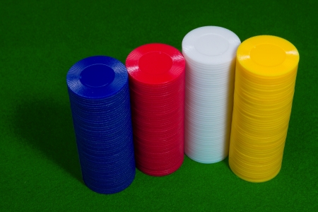 Color shot of a stack of various poker chipsの写真素材