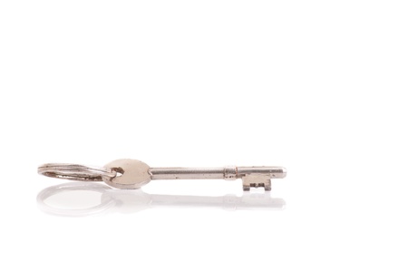 Old key on white background の写真素材