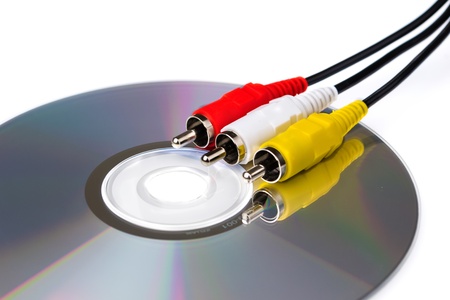 Audio video cables on cd, on white backgroundの写真素材