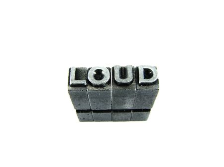 Loud sign, antique metal letter type isolatedの写真素材