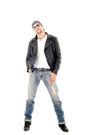 A macho motorcycle rider wearing his leather jacketの写真素材