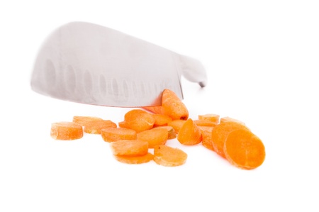 Fresh carrots knifed isolated on a white background. The concept - a dietary food, a diet for weight reduction.の写真素材
