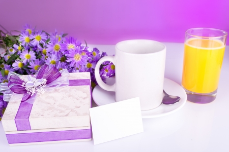 Breakfast in bed with gift and juiceの写真素材
