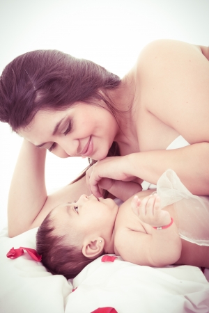 picture of happy mother with baby over whiteの写真素材