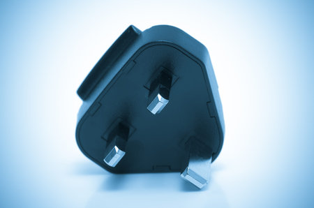 Electric plug isolated UK  color processed blue