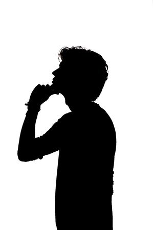 Thoughtful handsome male silhouetteの写真素材