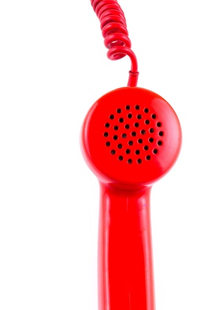 Red telephone receiver on white background の写真素材