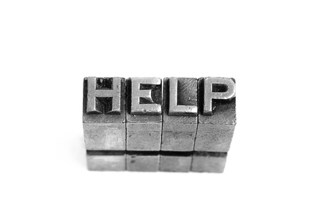 Help sign, antique metal letter typeの写真素材