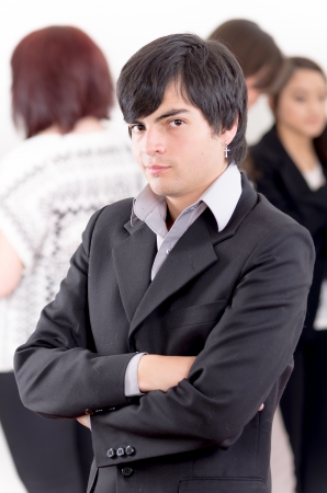 Alternative business man in front of a group of peopleの写真素材