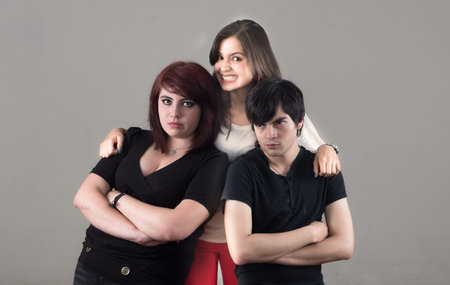 dark metal couple with happy colorful girl in the middle