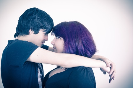 Portrait of a dark metal style couple in loveの写真素材