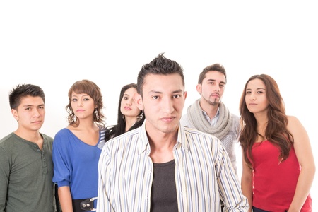 Group of young people, man at front, isolated on white background の写真素材