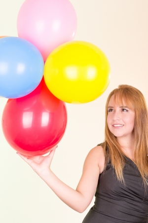 happy cute woman with balloonsの写真素材