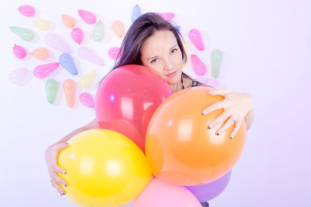 happy cute woman with balloonsの写真素材