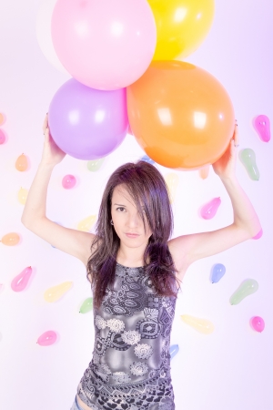 happy cute woman with balloonsの写真素材