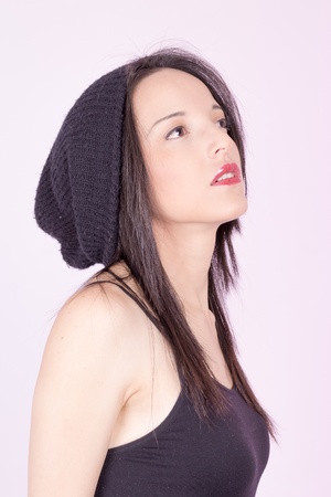 young woman wearing winter capの写真素材