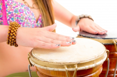 Young woman Playing the drumの写真素材