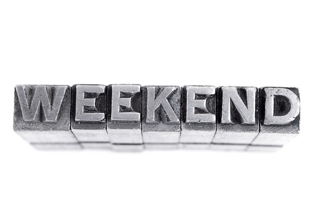 Weekend sign,  antique metal letter-press type isolatedの写真素材