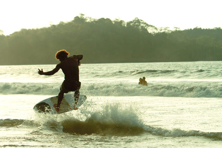 MOMPICHE, ECUADOR - DECEMBER 30  Unidentified Surfer preparing for local tournament, Mompiche is...