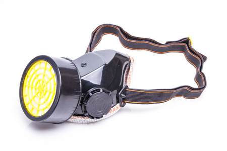 Respirator with interchangeable filter cartridges shot over whiteの写真素材