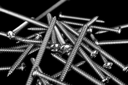 Screws on Black background