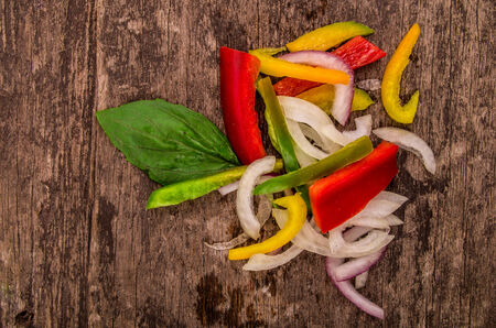 peppers on a wood backgroiundの写真素材