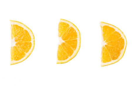 slices of orange on  white backgroundの写真素材