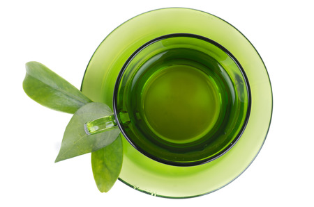 green tea in transparent cup and mint isolated on whiteの写真素材