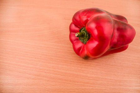 peppers on a wood backgroiundの写真素材
