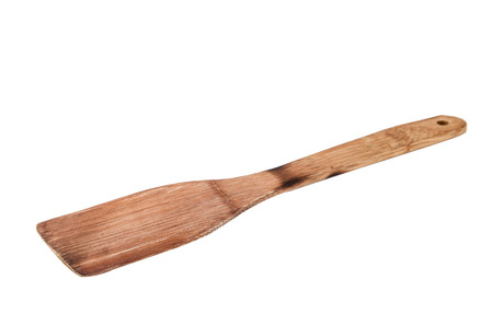 wood spoon cooking on a white backgroundの写真素材