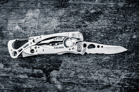 leatherman tool knife in the wood
